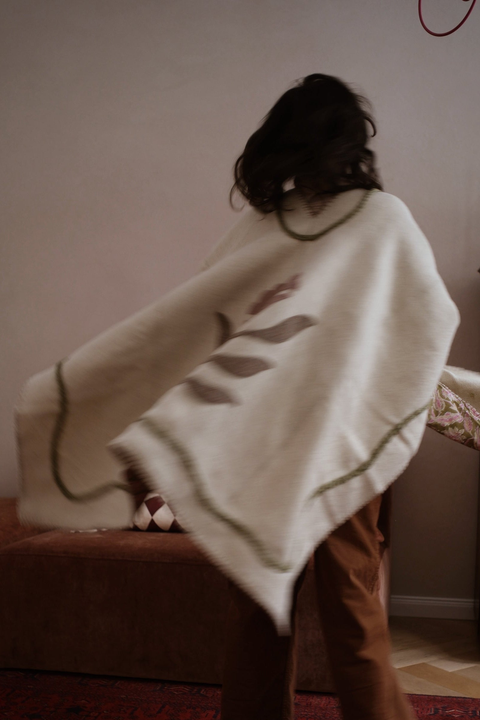 Artisan wool capes, ponchos, handmade, slow and fair produced. Sustainable luxury.